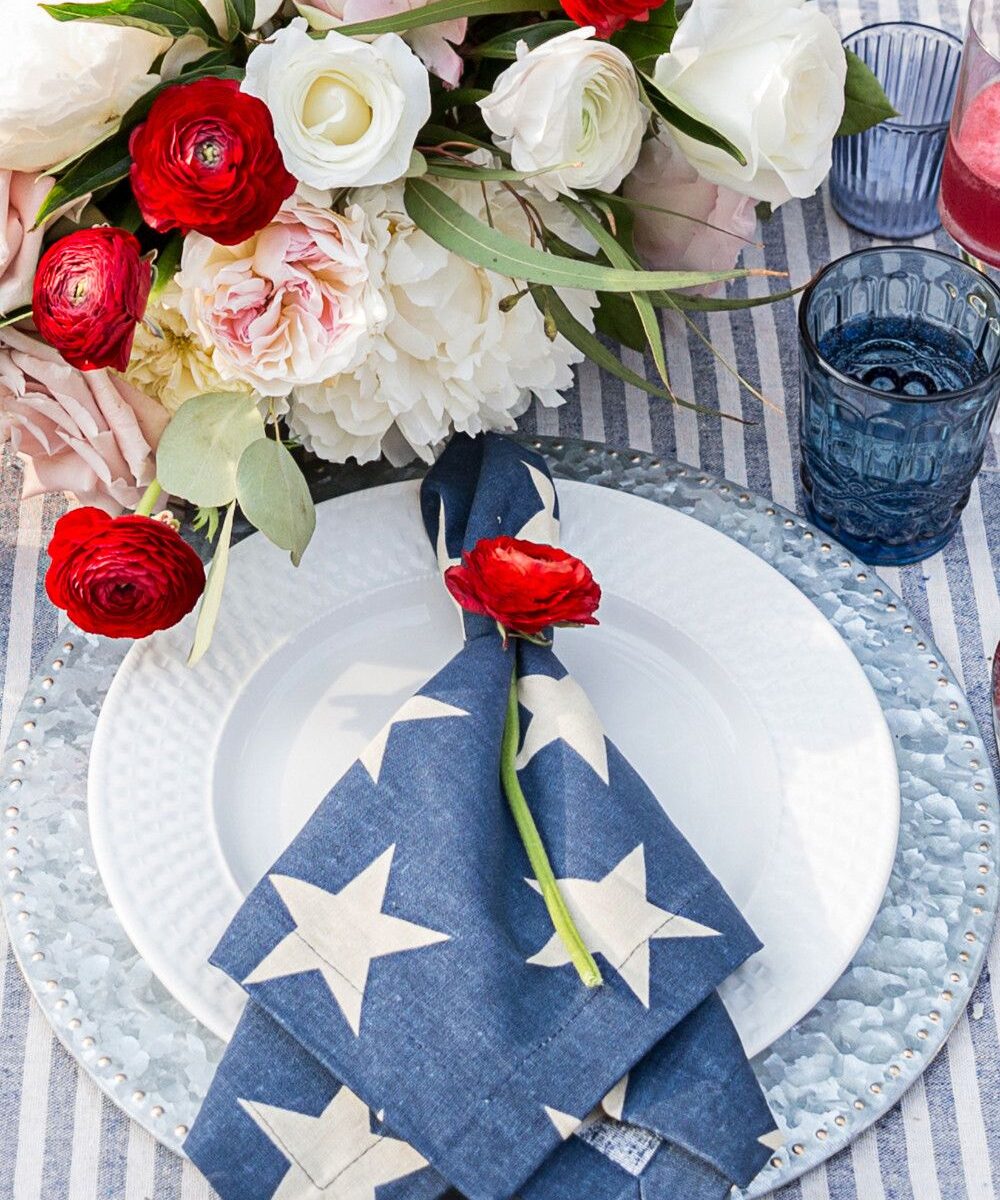 Blue napkin with white stars on a table
